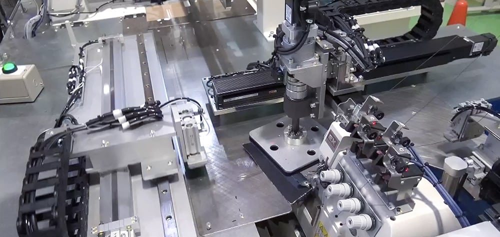 縫製自動機